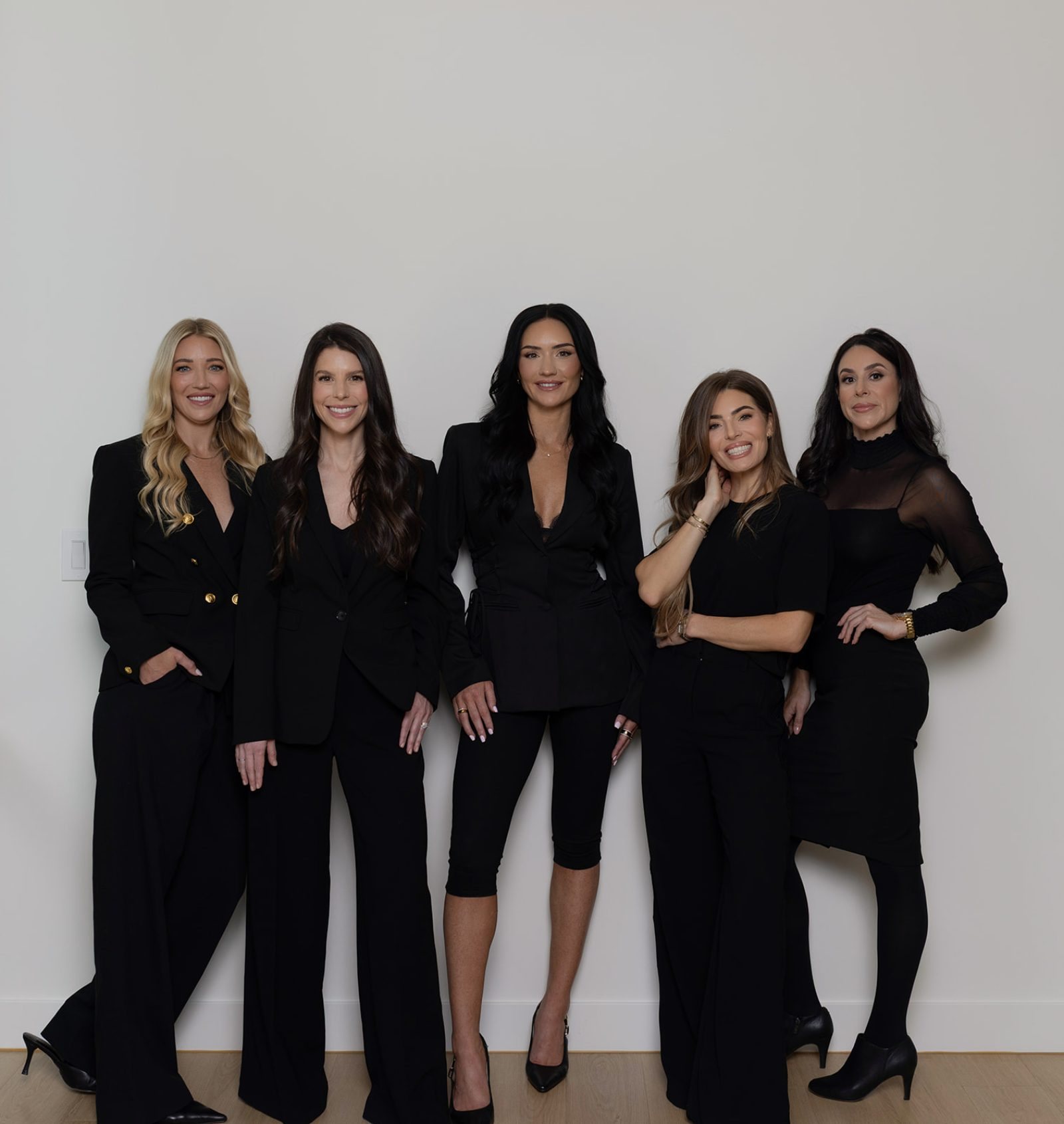 The five smiling providers of MODE Aesthetics and Wellness, your hosts for An Evening of Gratitude, photographed at the practice in North Scottsdale, Arizona.